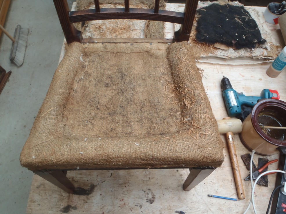 Dining chair requiring upholstery